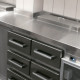 Close up of commercial kitchen stainless steel bench top